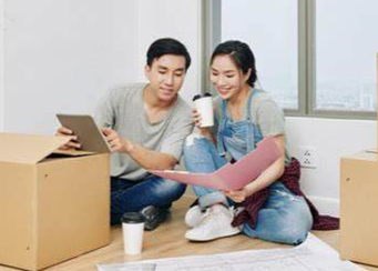 Couple with moving boxes